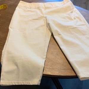 These are a cream color pair of capris They  are denim material..